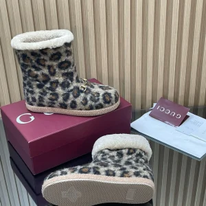 Gucci fur-trimmed ankle boots